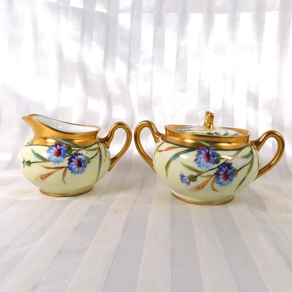 Cream and Gold Floral Sugar Bowl and Creamer Marked SW Donath # 26175
